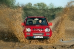 Suzuki Jimny 1.5L DDiS 86 CV (2008) Techo met&aacute;lico (2008) Todo terreno Rojo Brillante Exterior Frontal 3 puertas