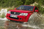Suzuki Grand Vitara 1.6L VVT 106 CV JX-A Todo terreno Rojo Brillante Exterior Frontal-Lateral 3 puertas