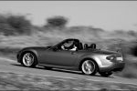 Mazda MX-5 2.0 Roadster Coup&eacute; Aut. Sportive Descapotable Galaxy Grey Mica Exterior Lateral-Posterior 2 puertas