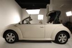 Volkswagen New Beetle Cabriolet 1.6 102 CV Gama New Beetle Cabriolet Descapotable Beige Cream Exterior Lateral 2 puertas