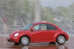 Volkswagen New Beetle Gama New Beetle Gama New Beetle Turismo Rojo Asi&aacute;tico Exterior Lateral-Frontal 2 puertas