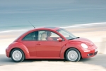 Volkswagen New Beetle Gama New Beetle Gama New Beetle Turismo Rojo Asi&aacute;tico Exterior Lateral-Frontal 2 puertas
