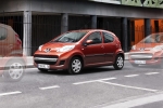 Peugeot 107 1.4 HDI Gama 107 Turismo Naranja Mandaline Exterior Lateral 5 puertas