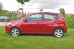 Chevrolet Aveo 1.2 16v GLP LS Turismo Flame red Exterior Lateral 5 puertas