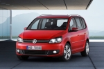 Volkswagen Touran 1.4 TSI 140 CV Gama Touran Monovolumen Rojo Cereza Salvaje Exterior Frontal-Lateral 5 puertas