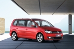 Volkswagen Touran 1.4 TSI 140 CV Gama Touran Monovolumen Rojo Cereza Salvaje Exterior Frontal-Lateral 5 puertas