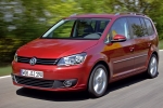 Volkswagen Touran 1.4 TSI 140 CV Gama Touran Monovolumen Rojo Cereza Salvaje Exterior Frontal-Lateral 5 puertas
