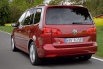 Volkswagen Touran 1.4 TSI 140 CV Gama Touran Monovolumen Rojo Cereza Salvaje Exterior Lateral-Posterior 5 puertas