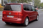 Volkswagen Touran 1.4 TSI 140 CV Gama Touran Monovolumen Rojo Cereza Salvaje Exterior Posterior-Lateral 5 puertas