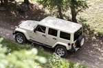 Jeep Wrangler Gama Wrangler Unnlimited (Modelo EE.UU.) Unlimited Sahara (Modelo EE.UU.)  Todo terreno Sahara Tan Exterior Cenital-Lateral-Posterior 5 puertas