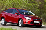 Ford Focus 1.6 TDCi 114 CV Titanium Turismo Rojo El&eacute;ctrico Exterior Frontal-Lateral 4 puertas