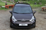 KIA Rio Gama Rio Gama Rio Turismo Wendy Brown Exterior Frontal 5 puertas