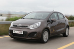 KIA Rio Gama Rio Gama Rio Turismo Wendy Brown Exterior Frontal-Lateral 5 puertas