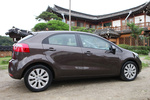 KIA Rio Gama Rio Gama Rio Turismo Wendy Brown Exterior Lateral 5 puertas
