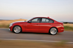 BMW Serie 3 335i (306 CV) Sport Line Turismo Melbourne Rot Metalizado Exterior Lateral 4 puertas