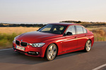 BMW Serie 3 335i (306 CV) Sport Line Turismo Melbourne Rot Metalizado Exterior Frontal-Lateral 4 puertas