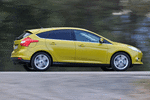 Ford Focus 1.0 EcoBoost 125 CV Titanium con &laquo;Paquete Ford Individual&raquo; Turismo Amarillo Mustard Exterior Lateral 5 puertas