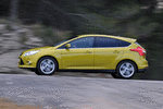 Ford Focus 1.0 EcoBoost 125 CV Titanium con &laquo;Paquete Ford Individual&raquo; Turismo Amarillo Mustard Exterior Lateral 5 puertas