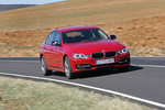 BMW Serie 3 328i (245CV) Sport Line Turismo Melbourne Rot Metalizado Exterior Lateral-Frontal 4 puertas