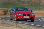 BMW Serie 3 328i (245CV) Sport Line Turismo Melbourne Rot Metalizado Exterior Lateral-Frontal 4 puertas