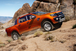 Ford Ranger 3.2 TDCi 200 CV 4x4 Wildtrack Pick up Naranja el&eacute;ctrico Exterior Lateral 4 puertas
