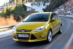 Ford Focus 1.0 EcoBoost 125 CV Titanium con &laquo;Paquete Ford Individual&raquo; Turismo Amarillo Mustard Exterior Frontal-Lateral 5 puertas