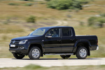 Volkswagen Amarok 2.0 TDI 180 CV BMT DSG 4Motion Doble Cabina Highline Pick up Negro Profundo Exterior Lateral 4 puertas