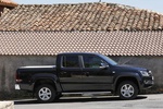 Volkswagen Amarok 2.0 TDI 180 CV BMT DSG 4Motion Doble Cabina Highline Pick up Negro Profundo Exterior Lateral 4 puertas