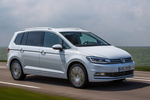 Volkswagen Touran 1.8 TSI 180 CV BMT DSG 7 vel. Sport Monovolumen Blanco Puro Exterior Lateral-Frontal 5 puertas
