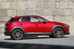Mazda CX-3 1.5 SKYACTIV-D 105 CV 2WD Luxury (Pack White) Todo terreno Soul Red Metallic Exterior Lateral 5 puertas