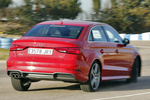 Audi A3 2.0 TDI 110 kW (150 CV) S tronic S-line A3 Sedan Turismo Rojo Tango Exterior Posterior-Lateral 4 puertas