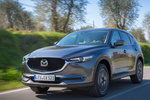 Mazda CX-5 2.2 SKYACTIV-D 129 kW (175 CV) 4WD Gama CX-5 Todo terreno Machine Grey Exterior Frontal-Lateral 5 puertas