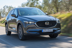 Mazda CX-5 2.2 SKYACTIV-D 129 kW (175 CV) 4WD Gama CX-5 Todo terreno Machine Grey Exterior Frontal-Lateral 5 puertas