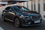 Mazda CX-3 2.0 SKYACTIV-G 110 kW (150 CV) AWD Zenith Todo terreno Machine Grey Exterior Frontal-Lateral 5 puertas