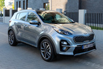 KIA Sportage 1.6 CRDi 100 kW (136 CV) 7DCT 4x4 Emotion Todo terreno Lunar Silver con Techo Black Pearl Exterior Frontal-Lateral 5 puertas