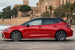 Toyota Corolla hybrid 180H Advance Turismo Bi-tono Rojo Emoci&oacute;n Exterior Lateral 5 puertas