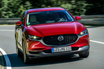 Mazda CX-30 2.0 SKYACTIV-G 122 CV Aut. Zenith Todo terreno Soul Red Crystal Exterior Lateral-Frontal 5 puertas