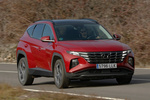Hyundai Tucson 1.6 T-GDI HEV 169 kW (230 CV) 4x4 6AT Style H&iacute;brido Todo terreno Engine Red Exterior Lateral-Frontal 5 puertas