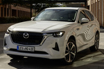Mazda CX-60 Gama CX-60 PHEV Takumi PHEV Todo terreno Rodium White Exterior Frontal-Lateral 5 puertas