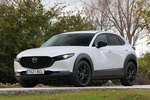 Mazda CX-30 2.5 e-SKYACTIV G 140 CV Nagisa Todo terreno Snowflake White Pearl Exterior Frontal-Lateral 5 puertas