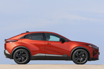 Toyota C-HR+ 230 bater&iacute;a 77 kWh Advance Todo terreno Rojo Persa Exterior Lateral 5 puertas